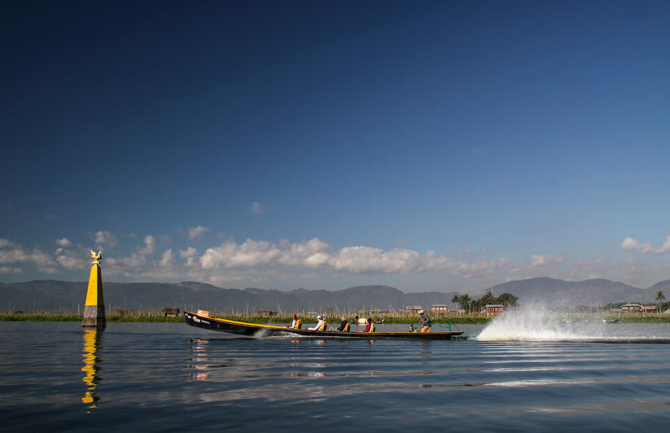 Long boats on Inle Lake where the locals have created a thriving economy whilst living on the lake.